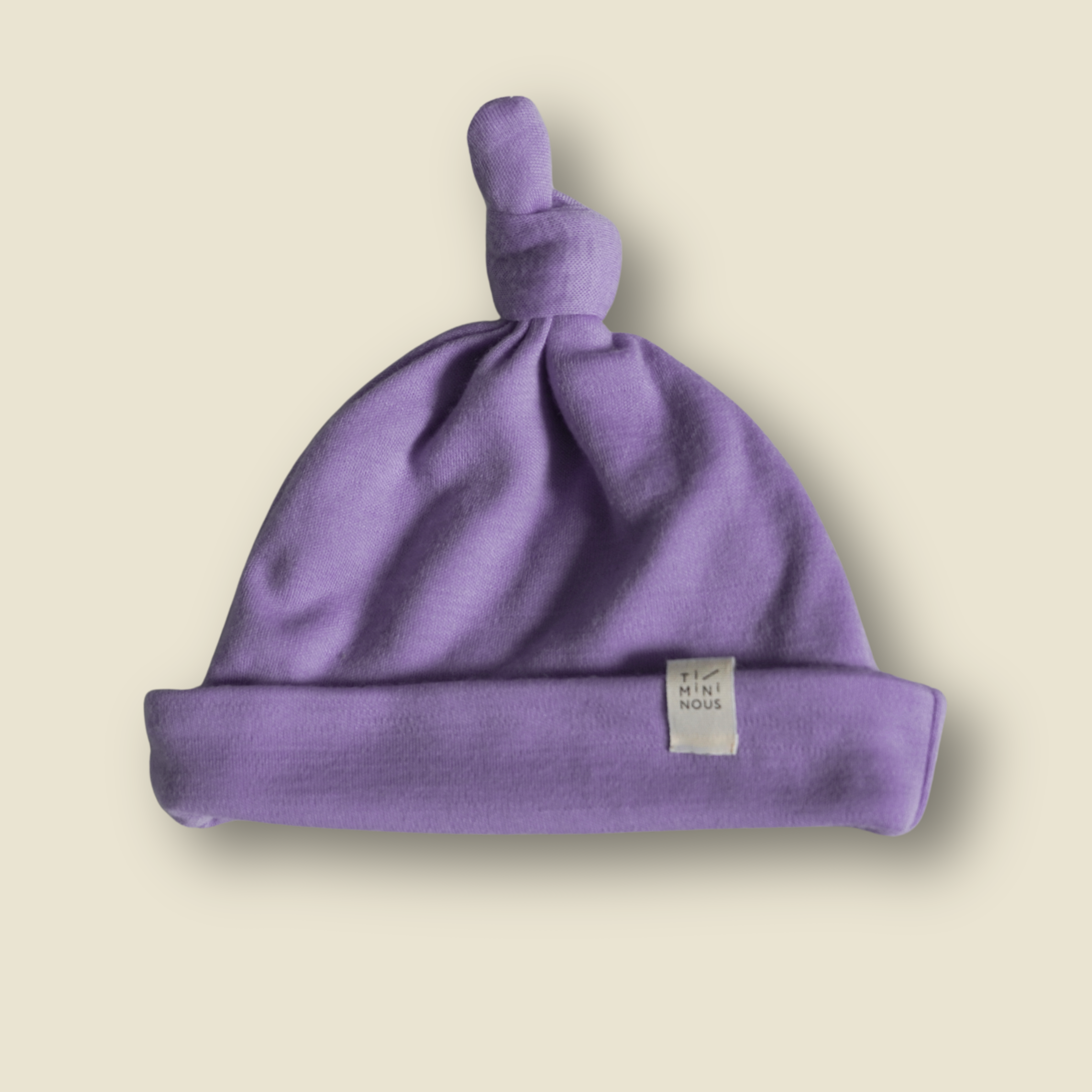 Collection of Bonnet à noeud évolutif en laine de mérinos - aube in a gallery layout