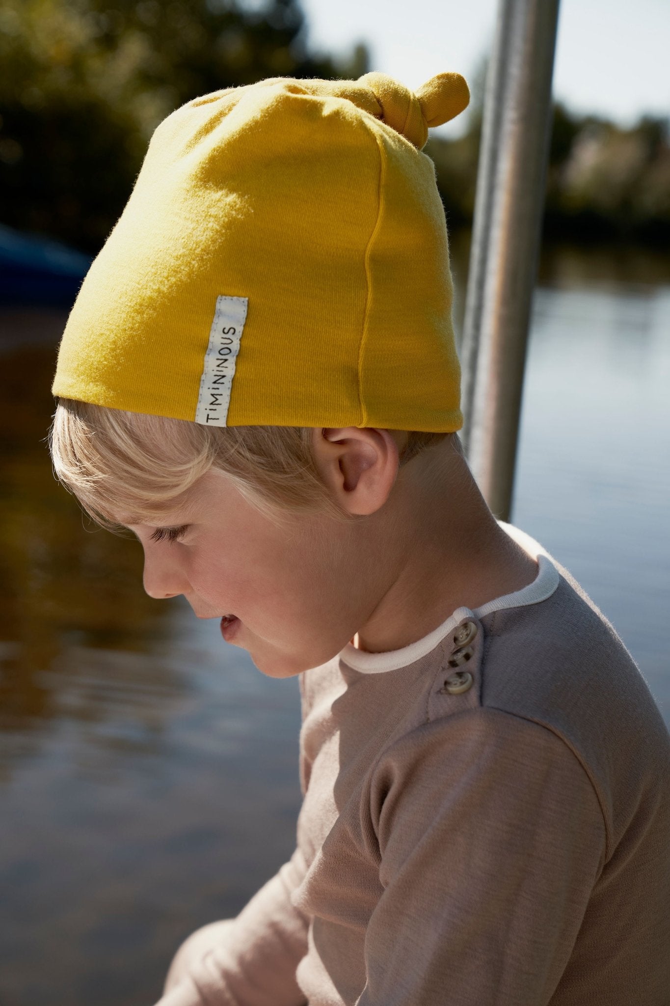 Collection of Bonnet à noeud évolutif en douce laine de mérinos - Curry - Timininous in a gallery layout